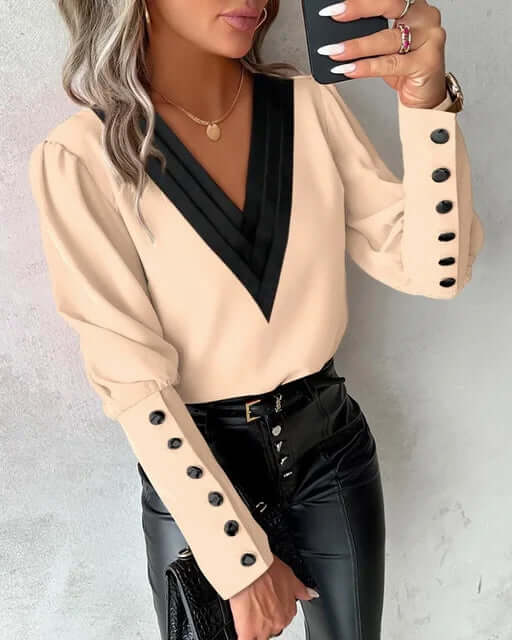 Elegant women's blouse with V-neck and long sleeves