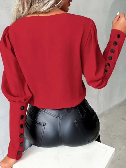 Elegant women's blouse with V-neck and long sleeves